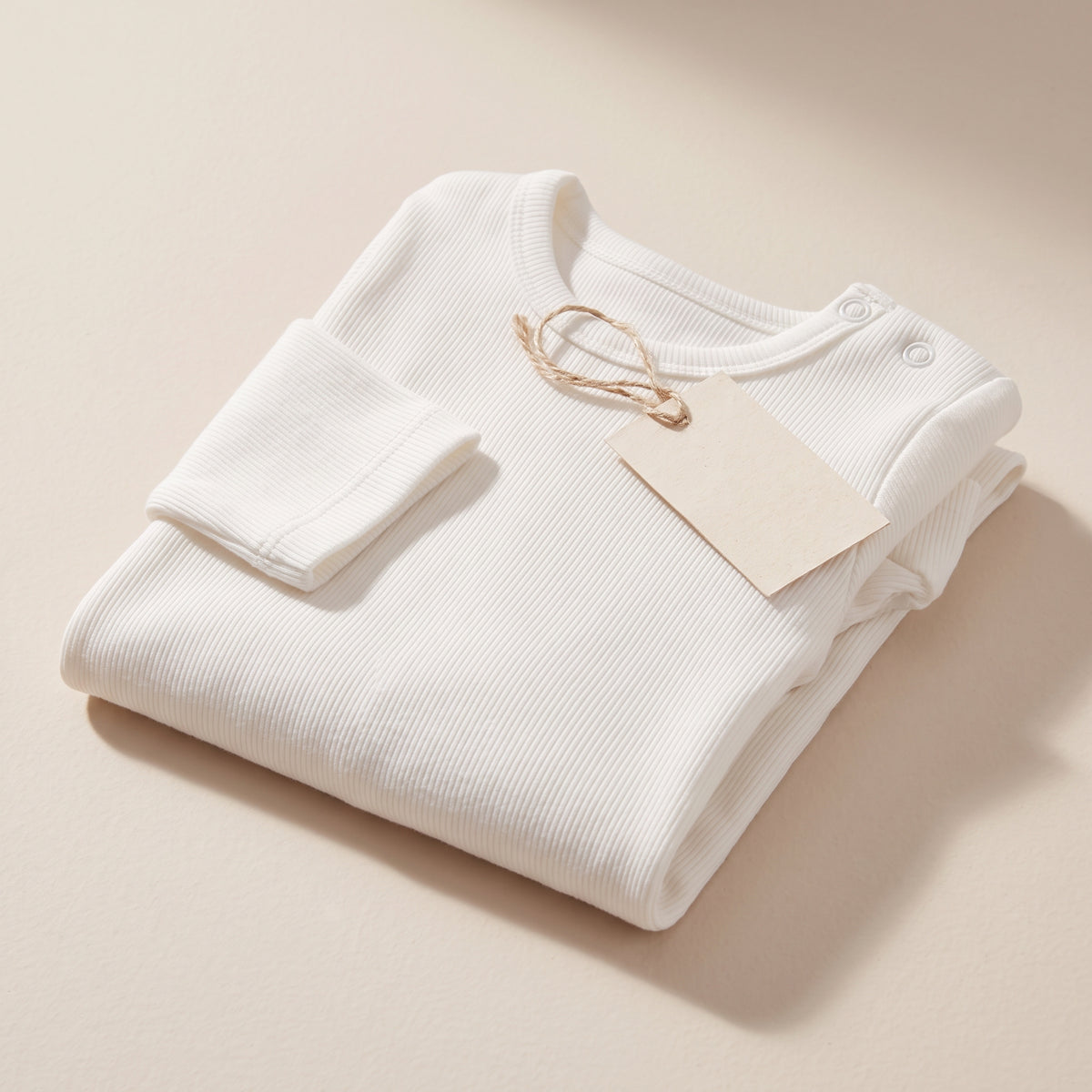 Organic Ribbed Cotton Newborn Footed Sleepsuit - White